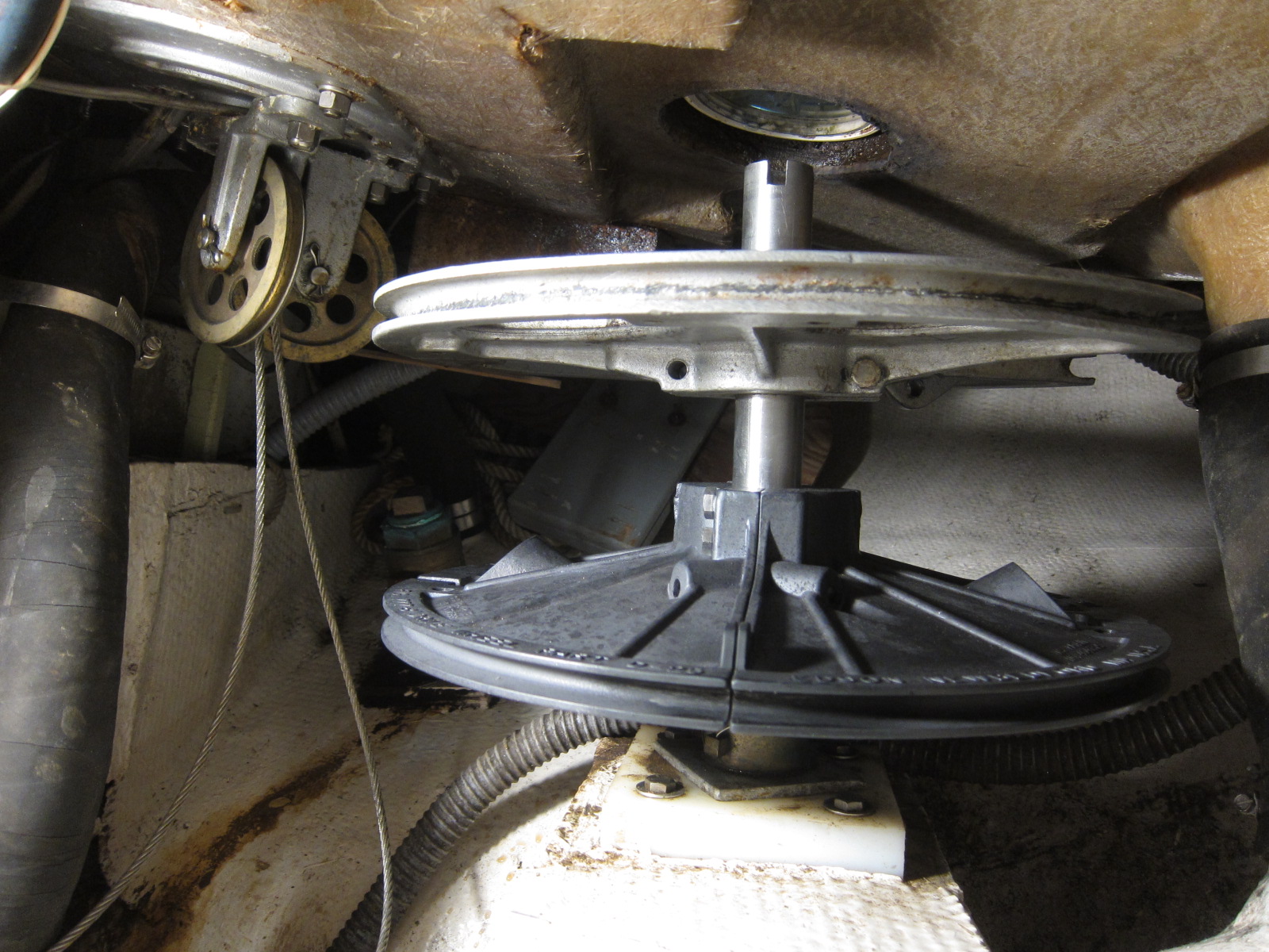 Comparing the new radial drive wheel to replace the stuck one.