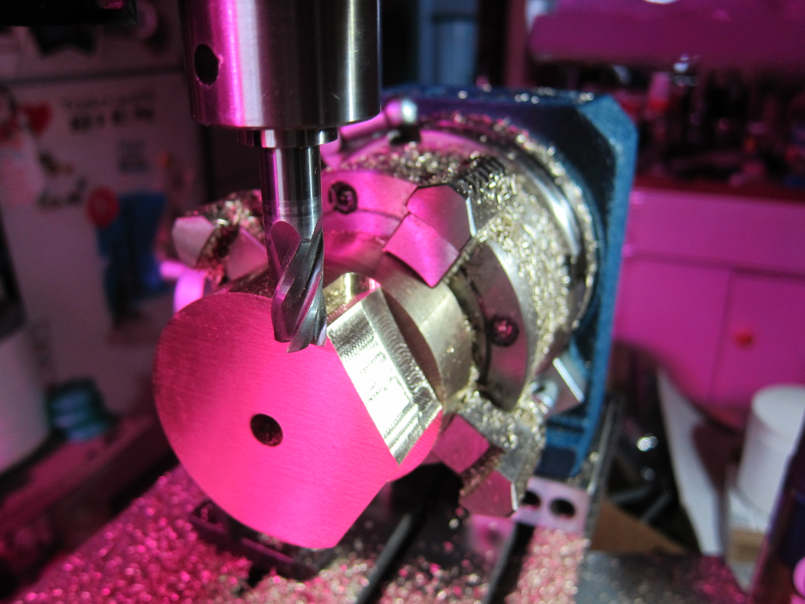 Using the mill to machine the hex part of the nut.