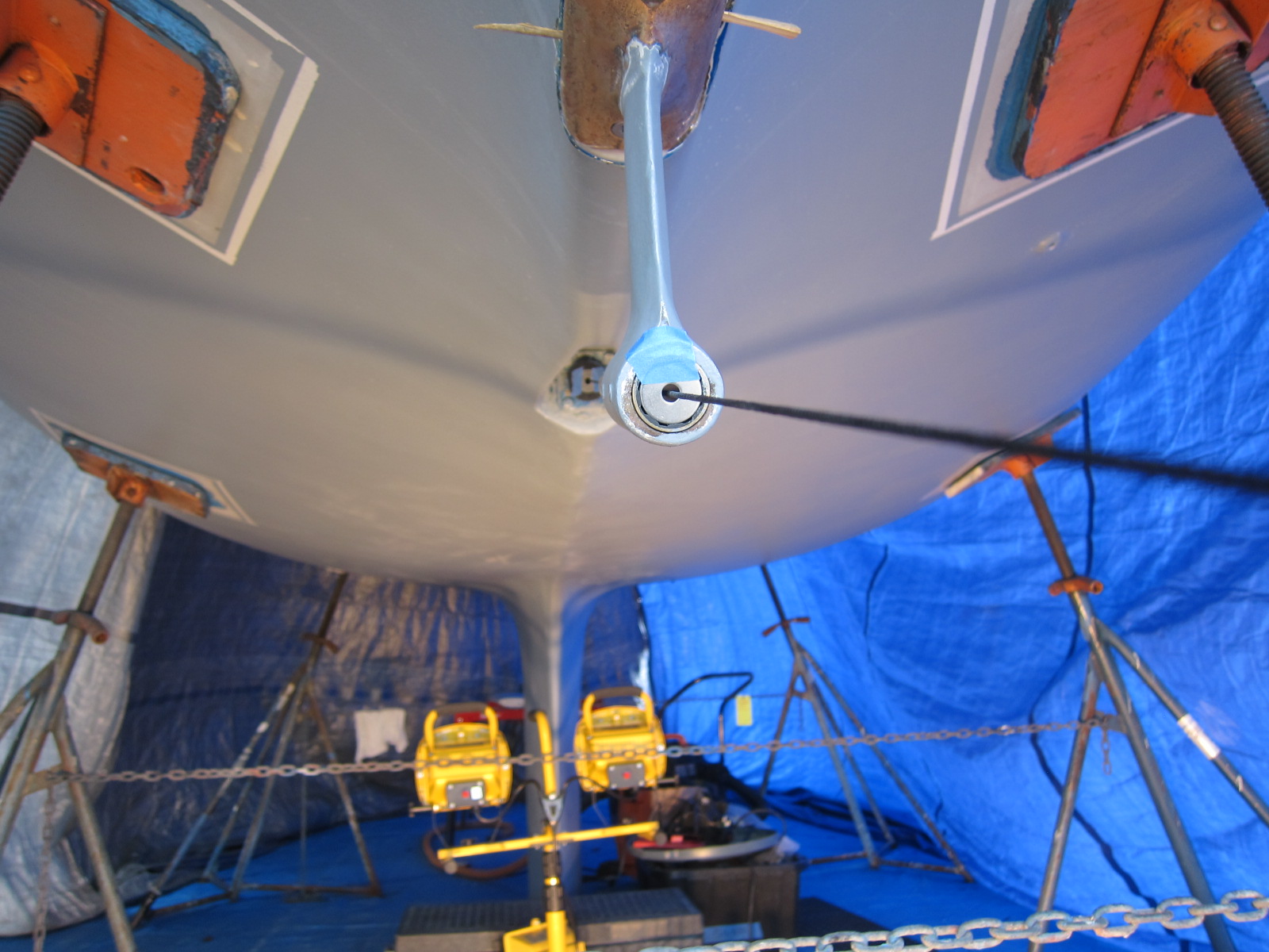 Shimmed strut looking down aligned string.