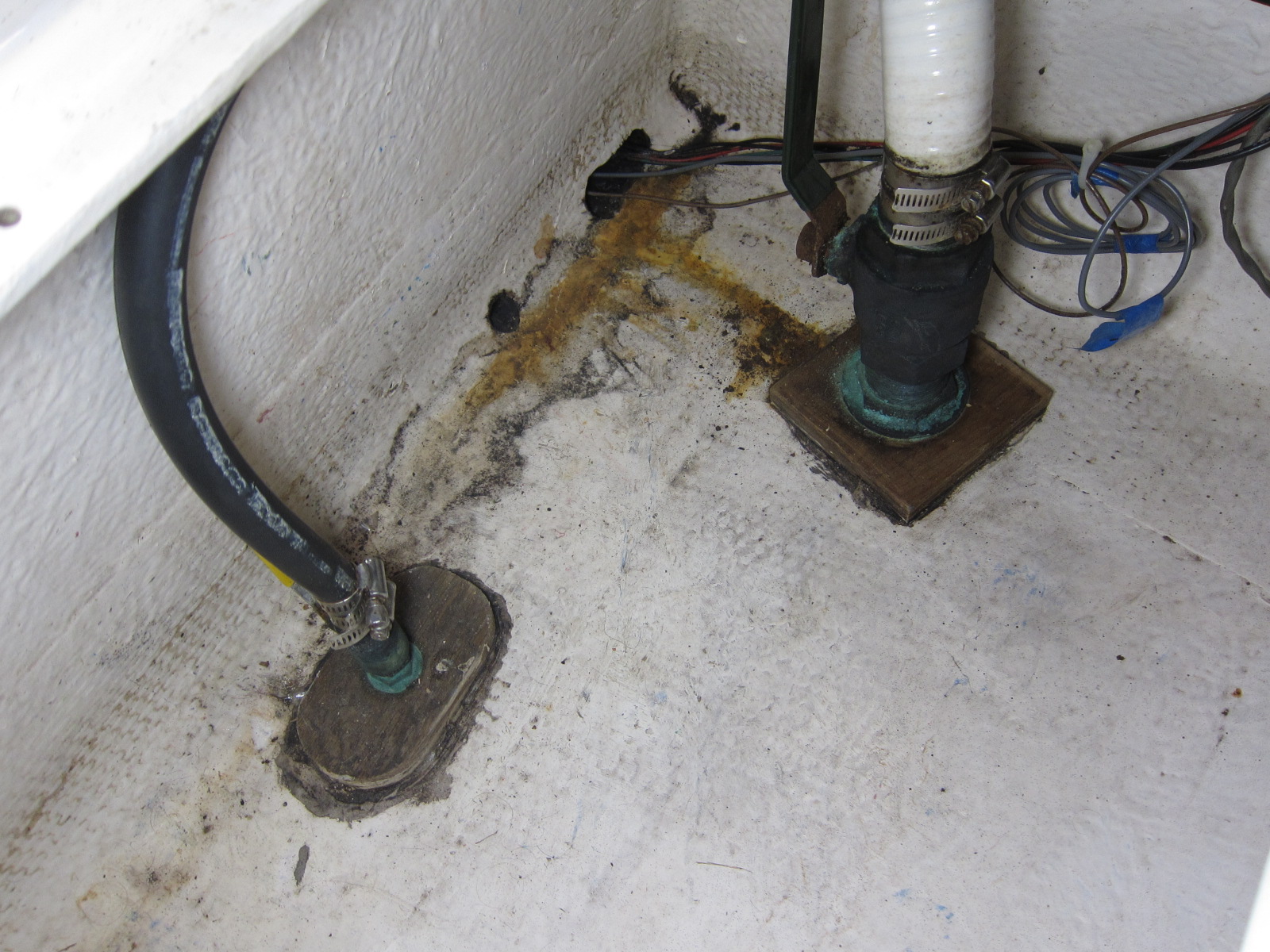 The state of the thru-hulls before work begins.